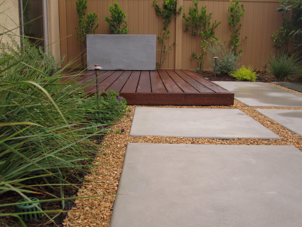 Ipe wood deck sealed with Penafin exotic wood treatment. Modular concrete pads.